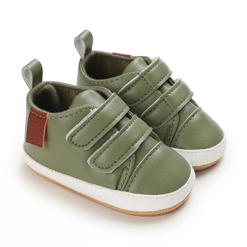 Green baby shoes with soft soles