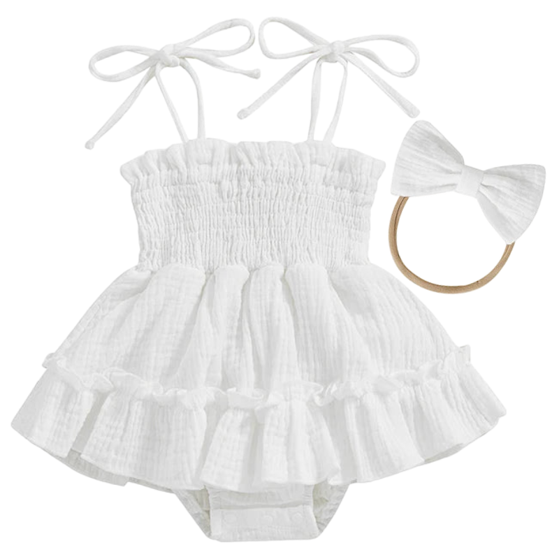 This image shows a white baby girl romper made with soft cotton.