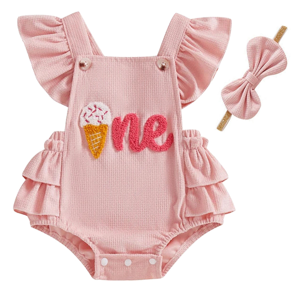 Baby girl first birthday outfit in pink with flutter sleeves and bow