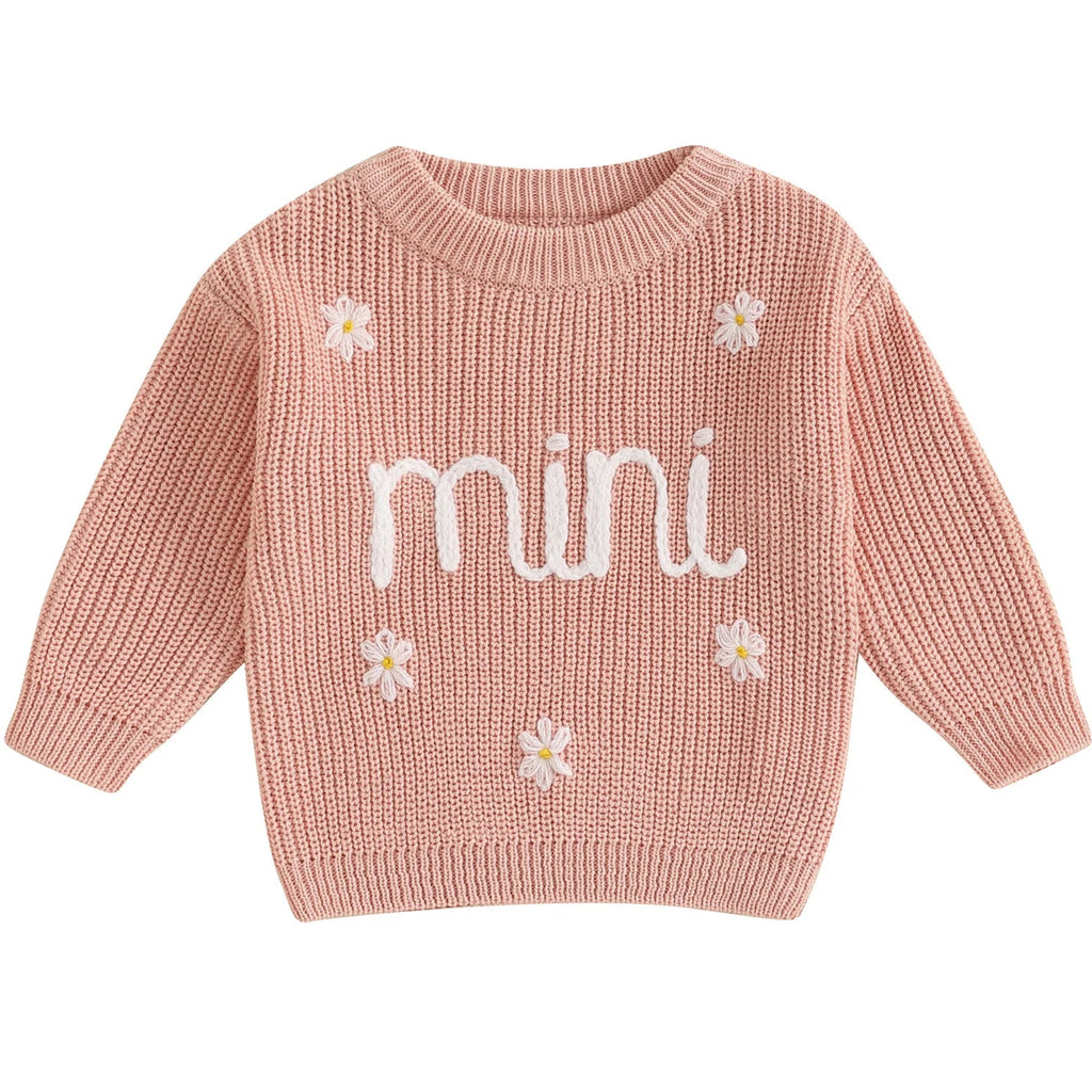 Soft peach baby jumper – chunky cotton knit for girls