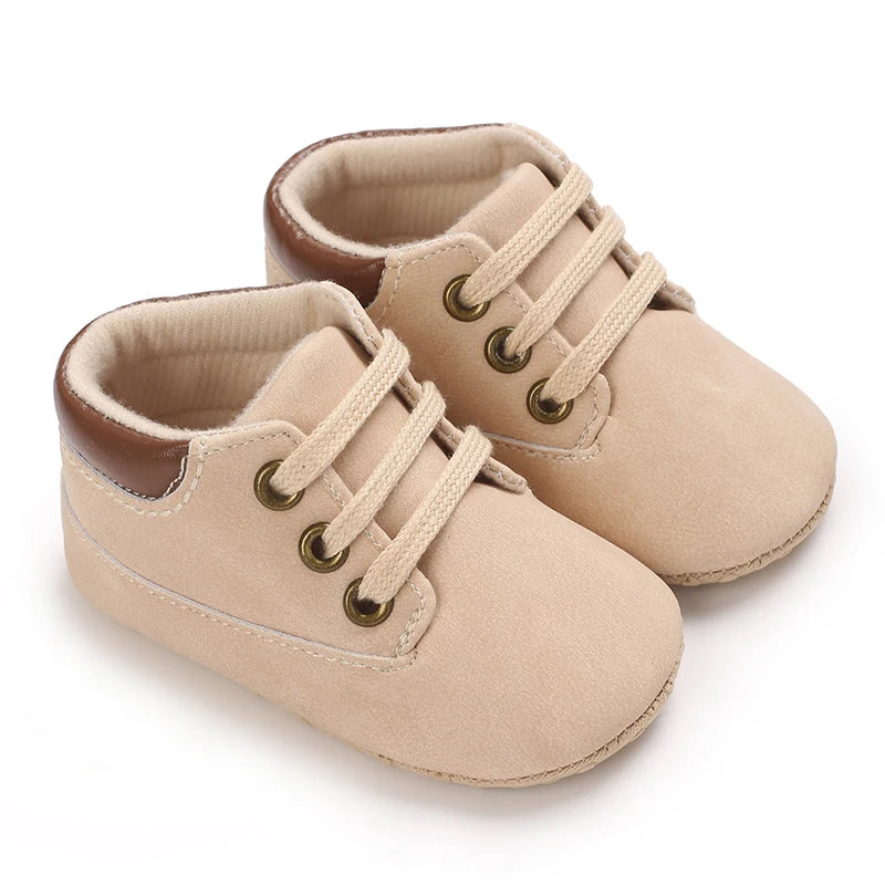 Soft sole cream boots for babies