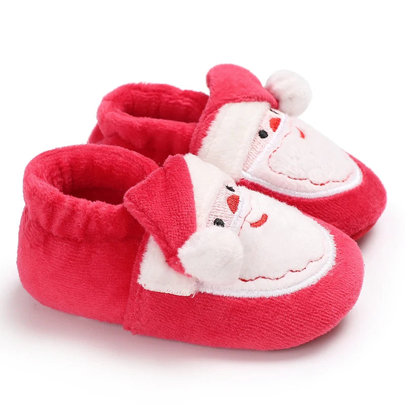 Red baby slippers with Santa face and hat