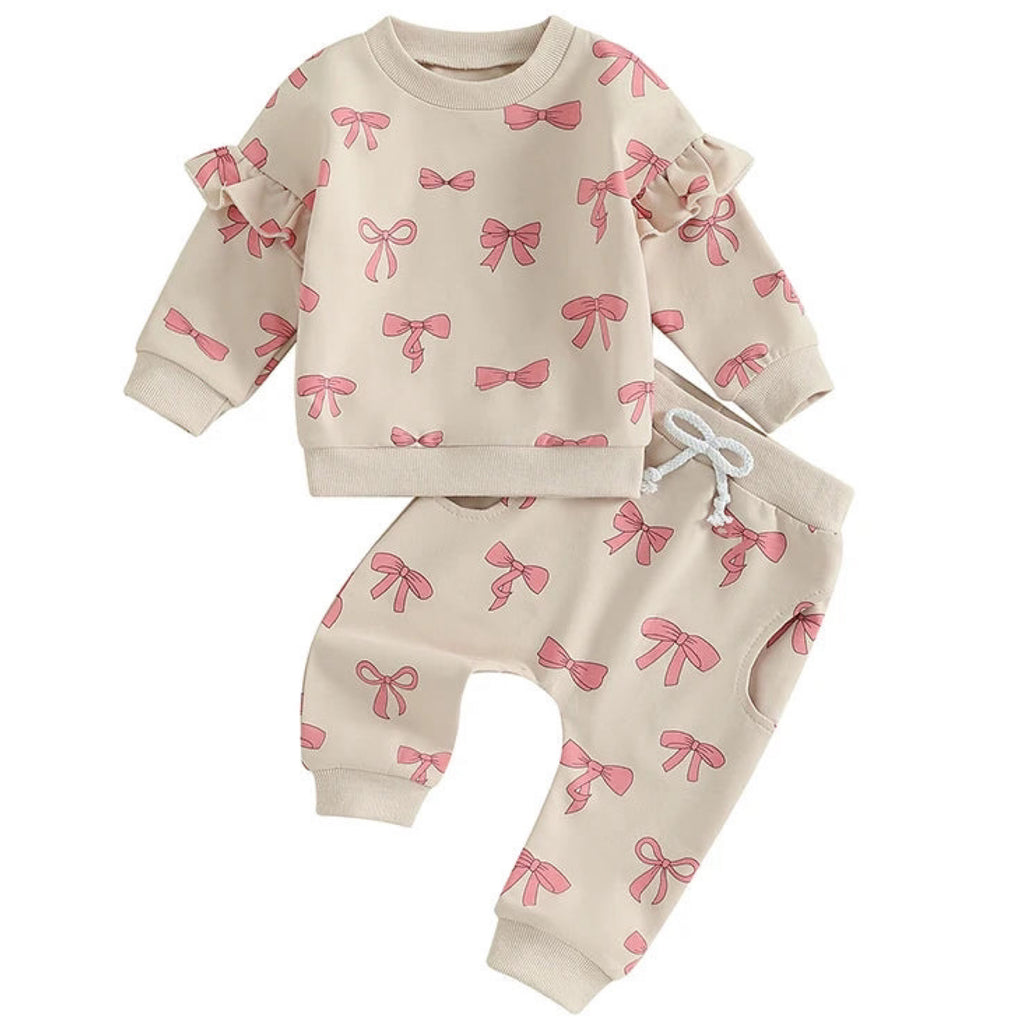 Cream tracksuit set with pink bows and ruffle sleeves for baby girls – Little Eedie


