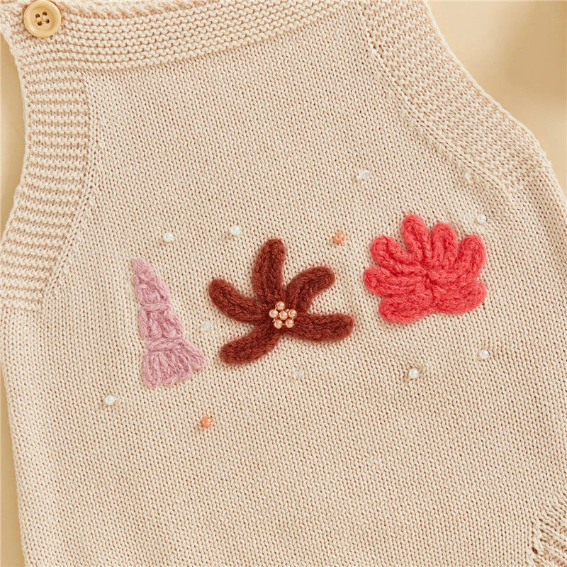 Cream baby girl knit beach romper with embroidered shells