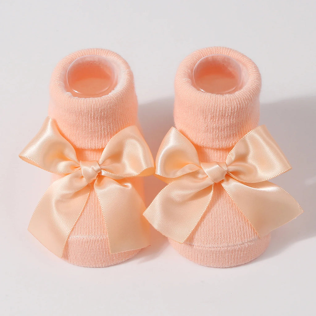 Newborn apricot socks with soft grip