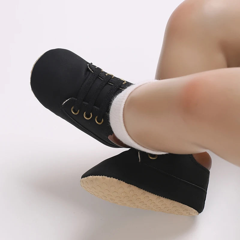 Little Eedie baby boots in black lace-up