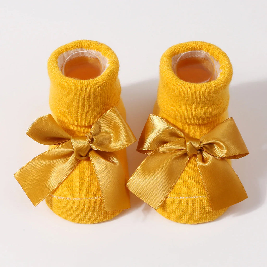 Mustard baby socks with satin bow