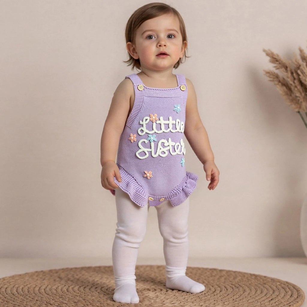 Baby girl in lavender “Little Sister” outfit