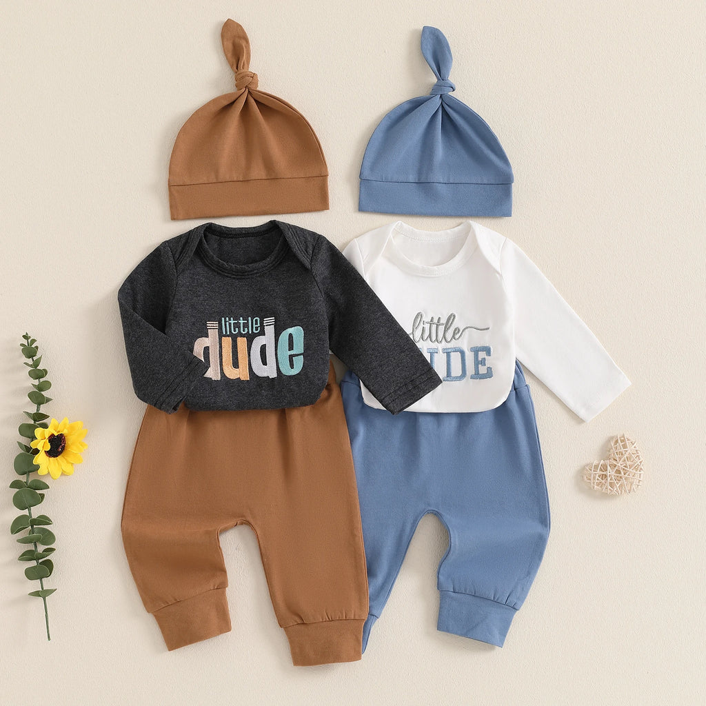 Black baby romper with colourful Little Dude print, brown leggings and beanie – Little Eedie baby boy outfit