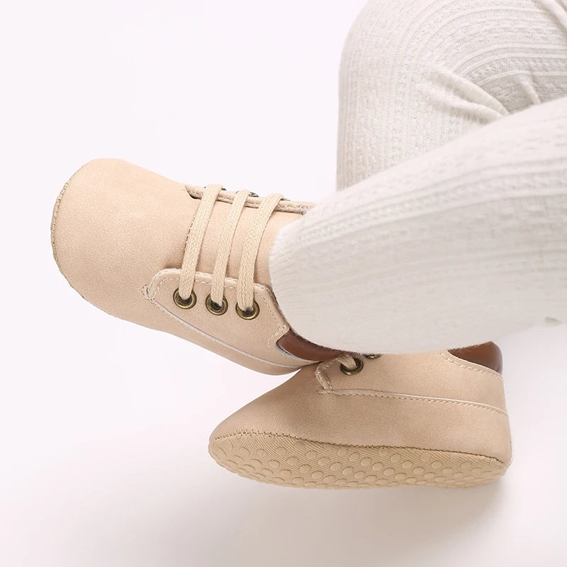 First walking shoes for baby boys in cream