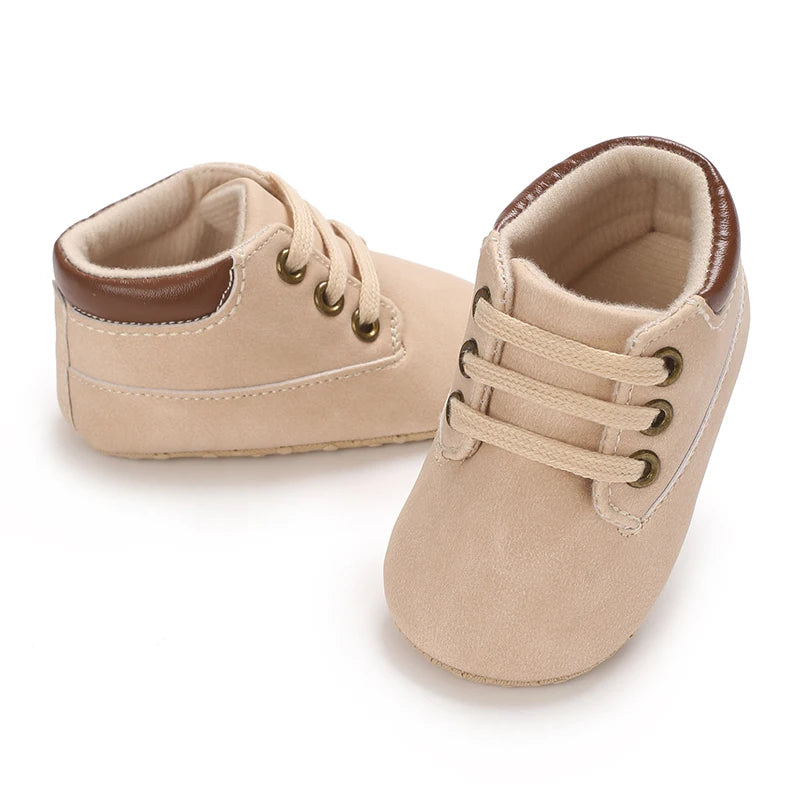 Cream baby shoes with grip soles