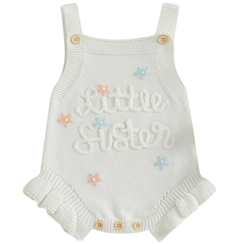 Newborn sibling romper in white knit for baby girl