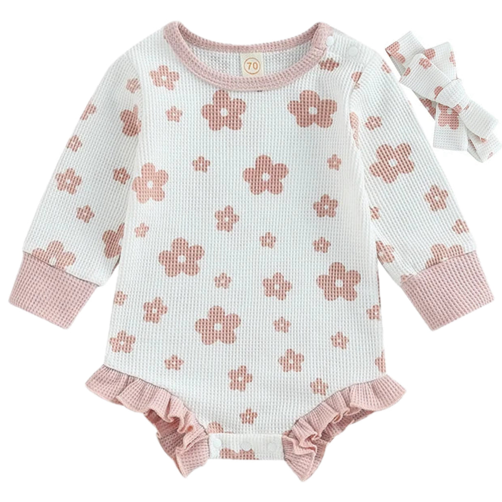 White baby girl romper with pink daisy print